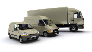 3D rendering of a truck, a van and a lorry against a neutral background